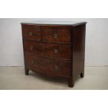 Regency Mahogany Bow Front Chest of Two Short over Two Long Drawers raised on swept bracket feet,