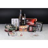 A group of James Bond and Elvis Presley collectables to include Books, card sets and ornaments.