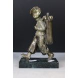 In the manner of Josef Lorenzl, Art Deco Table Lighter in the form of a Young Golf Caddy, raised