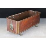 Copper Rectangular Planter with lion head drop ring handles and brass lion paw feet