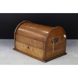 Late 19th / Early 20th century Oak Cabinet, the domed tambour rolled top opening to two compartments