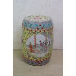 Chinese Ceramic Famille Rose Garden Seat of barrel form, decorated with panels of figures, studs and
