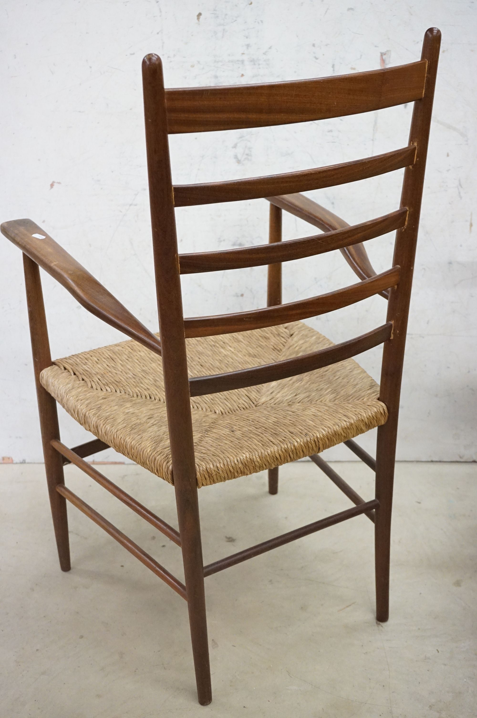 In the manner of Scadart, Pair of Mid century Retro Teak Ladder Back Elbow Chairs with rush seats, - Image 5 of 11