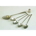 A small collection of hallmarked sterling silver to include spoons and thimble.