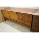 Mid century Retro Danish Influence Sideboard, with two sliding cupboard doors and four drawers,