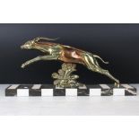 After Jacques Limousin, Art Deco Bronzed Leaping Gazelle mounted on a chequered black and white