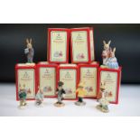 Seven Boxed Royal Doulton Bunnykins Figures including Girl Skater, Boy Skater, School Master, Groom,