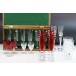 Glassware including Four Champagne Flutes with spiral twist stems, Set of Eight Red Glass