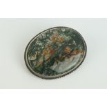 Moss Agate Oval Brooch in a white metal setting, 4.5cm long