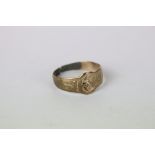A gents vintage hallmarked 9ct gold buckle ring.