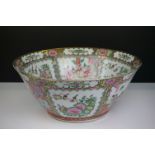 Large Chinese Cantonese Famille Rose Punch Bowl decorated with panels of figures and panels of