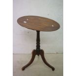 George III style Oval Wine / Lamp Pedestal Table raised on three shaped carved legs, 61cm wide x