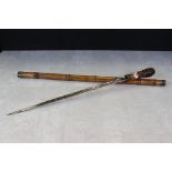 19th century Bamboo Sword Stick with root handle and tapering steel blade, 88cm long