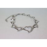 Silver and Heart shaped Bracelet with czs