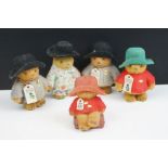 A collection of five miniature Paddington Bear felt figures.