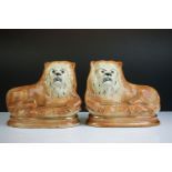 Pair of Staffordshire Pottery Recumbent Mantle Lions with Glass Eyes, 29cm long