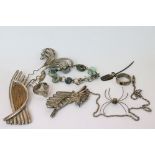 A collection of vintage white metal jewellery to include brooch, rings and hair clip.