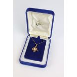 A fully hallmarked 9ct gold ladies necklace and pendant set with pearl to centre.