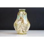 Della Robbia Pottery (Birkenhead 1894-1906) Lozenge shaped Vase with painted leaf and flower