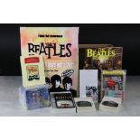 A box of The Beatles collectables to include books, mugs, signs, plates...etc.