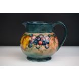 William Moorcroft Flambe Jug in the Leaf and Berry pattern, impressed Moorcroft mark to base and