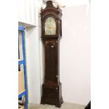 George III Mahogany Longcase Clock, three winding holes, the arched face with moon-phase, brass dial