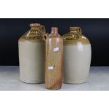 A collection of three stoneware advertising bottles to include a Harrods example.