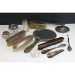 A collection of mainly hallmarked sterling silver items to include hand mirrors, brushes etc