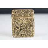 Brass Vesta with embossed heraldic shield decoration