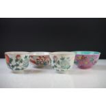Pair of Chinese Porcelain Famille Rose Tea Bowls decorated with flowers, six character marks to