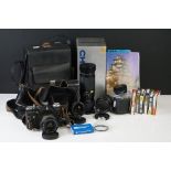 A 1980 olympics Zenit SLR 35mm camera together with lenses, filters, case....etc.