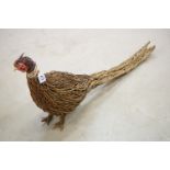 Large Willow-weaved Model of a Pheasant, 110cm long together with two Wire Work Black Plant Urns