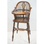 Elm and Ash Stick and Hoop Back Child's High Chair raised on turned legs with a foot rest and