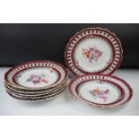 Seven Meissen reticulated Plates decorated with sprays of flowers within a ribbon border and pierced