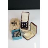 A small group of collectables to include a cased mother of pearl stud set, hallmarked silver bangle,