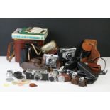 A collection of vintage photography equipment to include a Leica Ernst Leitz Wetzler D.R.P. camera