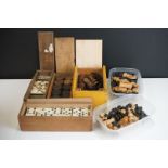 A collection of vintage games to include wooden chess sets, wooden draughts sets and bone dominoes