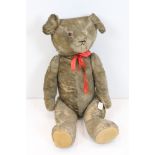 Early to Mid 20th century Straw-filled Mohair Teddy Bear with stitched nose and elongated body