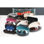 A collection of designer sunglasses to include Channel, Ray Ban and DKNY examples.