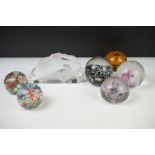 Seven Glass Paperweights including Mats Jonasson ' Seal ', Caithness ' Pink Champagne ', two