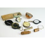 A group of mixed collectables to include a map measure, directional compass, silver cased pocket