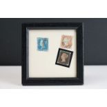 A framed and glazed collection of three victorian stamps to include a penny black, two penny blue
