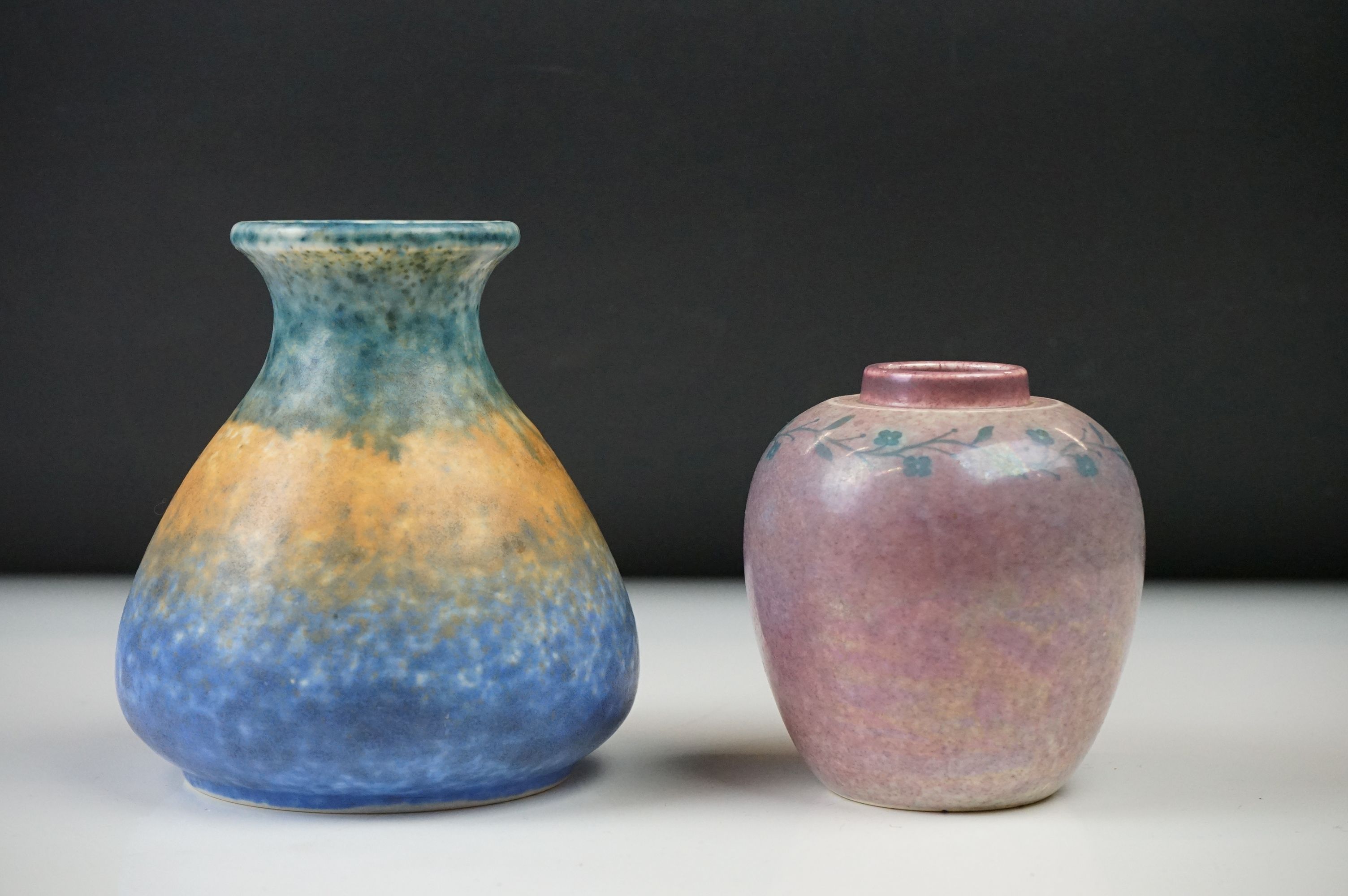 Two Ruskin Pottery Vases, one with green ochre and blue mottled glaze, dated 1930, 12cm high, the