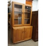 Ercol Light Elm Bookcase / Display Cabinet with two bevelled glazed doors opening to two