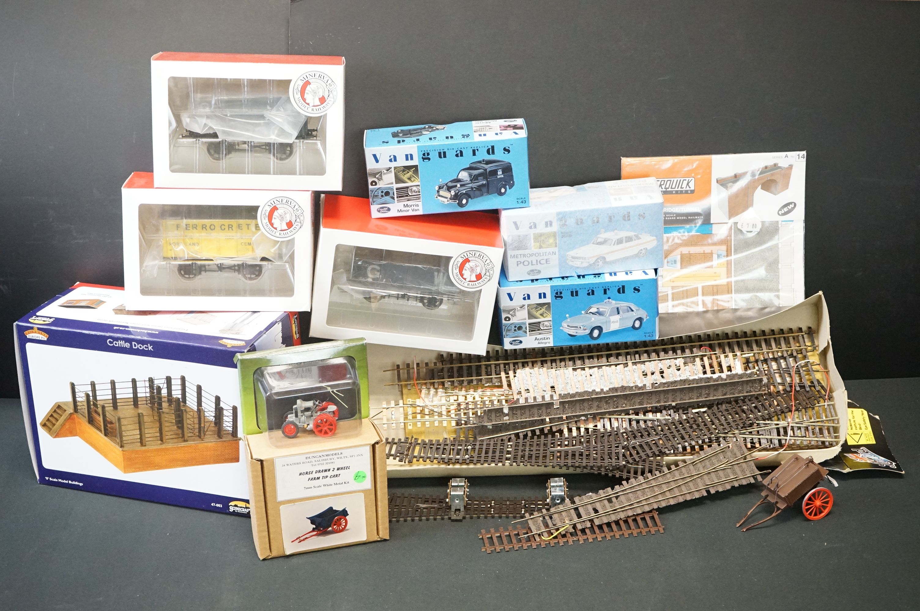 Three boxed Minerva Model Railways O gauge items of rolling stock, a boxed Bachmann OO gauge