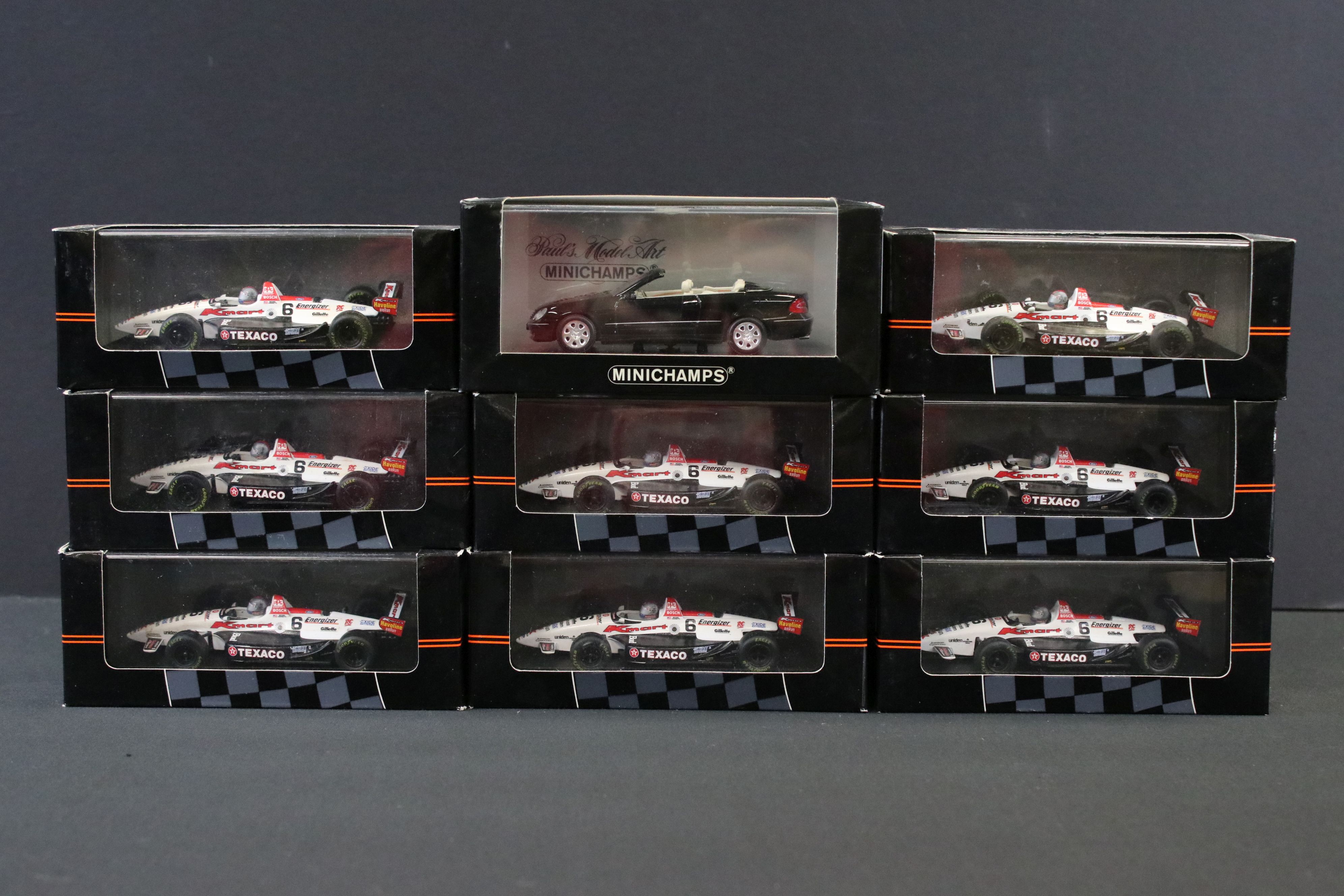 Eight cased Onyx Indy Car Collection diecast model racing cars together with a Paul's Model Art