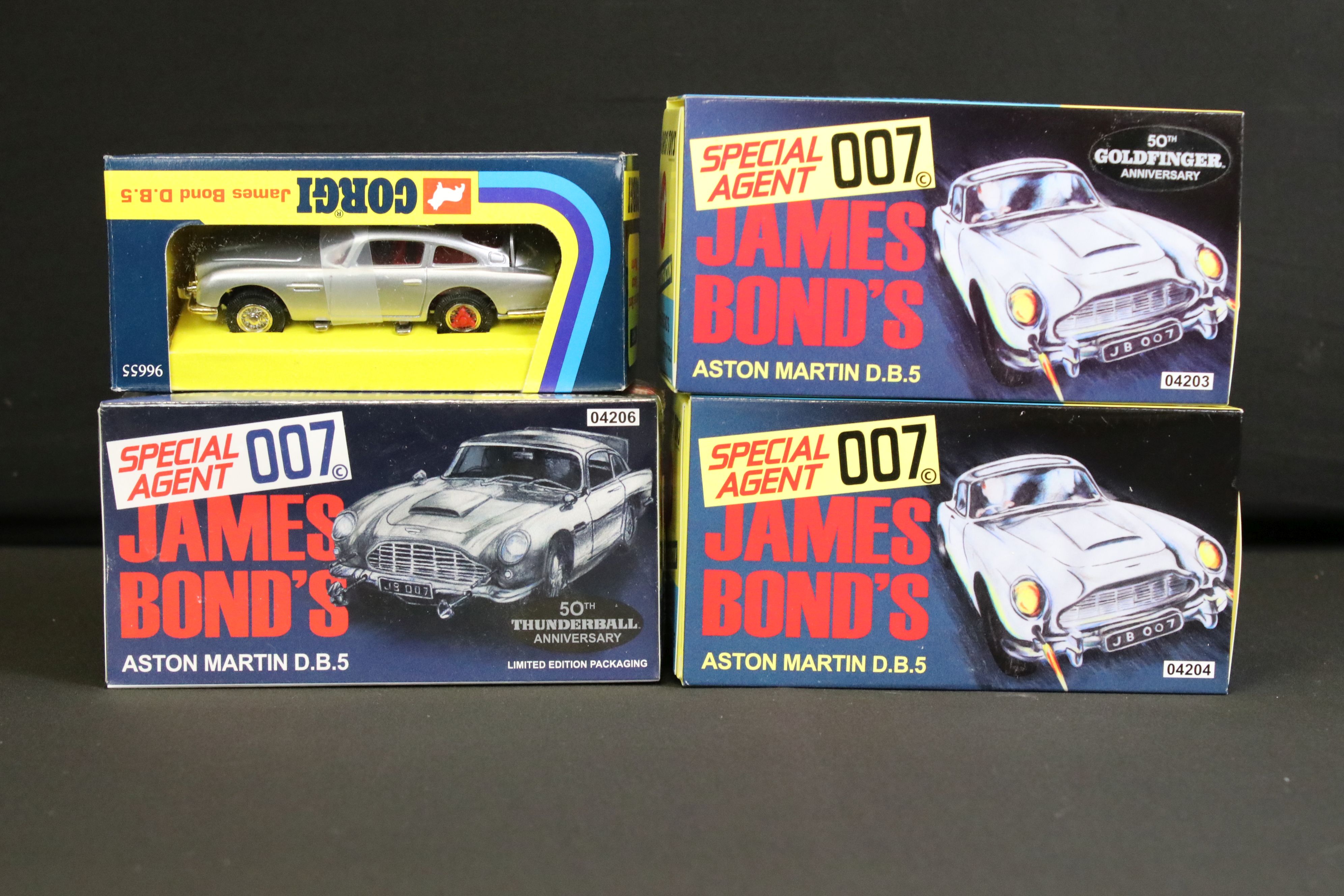 Three boxed Hornby Corgi James Bond diecast models to include 2 x 04203 Aston Martin DB5 and a