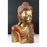 Large South East Asian / Thai Wooden Buddha with a gilded and red lacquered finish, 56cm high