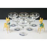 Set of Six Babycham glasses, 10.5cm high, together with two plastic Babycham advertising figures (