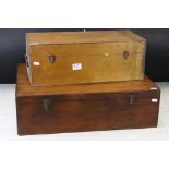 A collection of glass scientific instruments and containers within two fitted wooden cases.